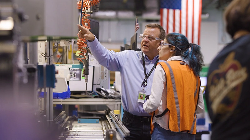 A team is checking machine